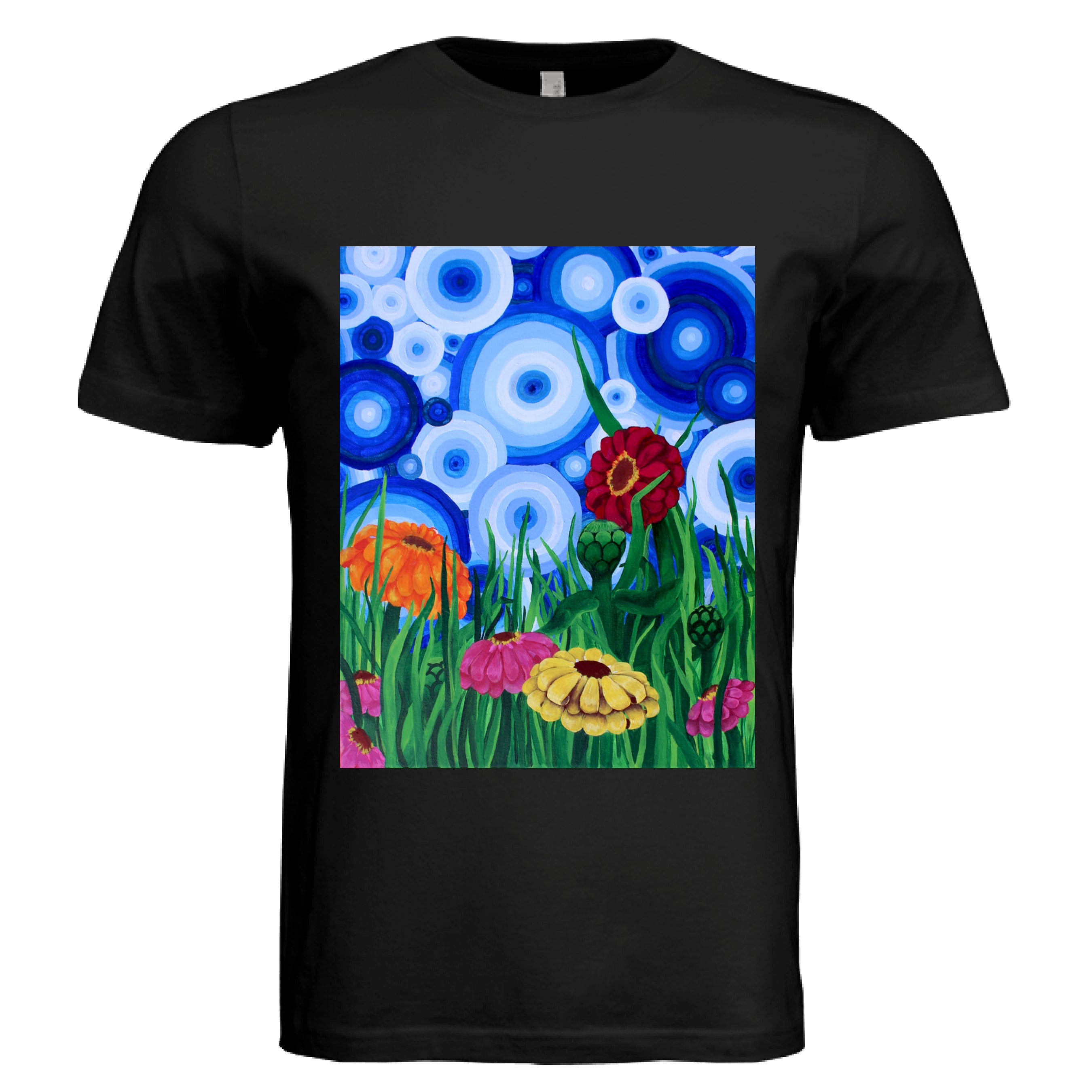 This is the Black Zinnia 2 T-Shirt by Storm Garden Studio. This showcases the front of the shirt. The rectangular illustration are bold and color zinnias like red, yellow and orange across tall green grass. The background has many different circles in blue, dark blue and white. The shirt is against a white background.