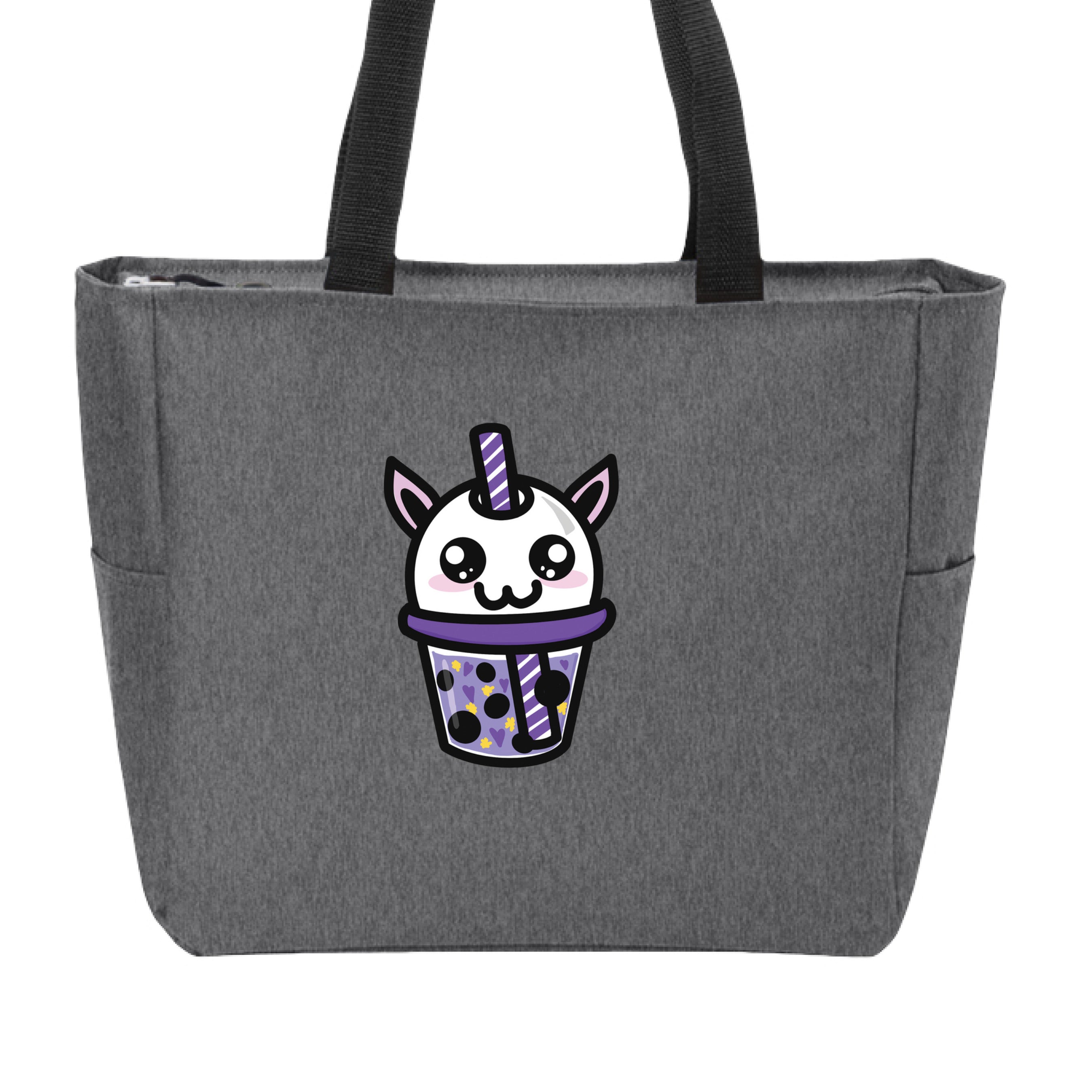 This is the Heather Grey Cryptid Boba Zip Tote by Dazzle & Daggers Design. This is showcasing the front and the handles are black. The Cryptid Boba is white, has cute light pink oval cheeks under big black and white sparkly eyes. It's mouth is in the shape of the number 3, purple and white swirl straw. In the glass is purple liquid, black boba, yellow stars and purple hearts. The tote is against a white background.