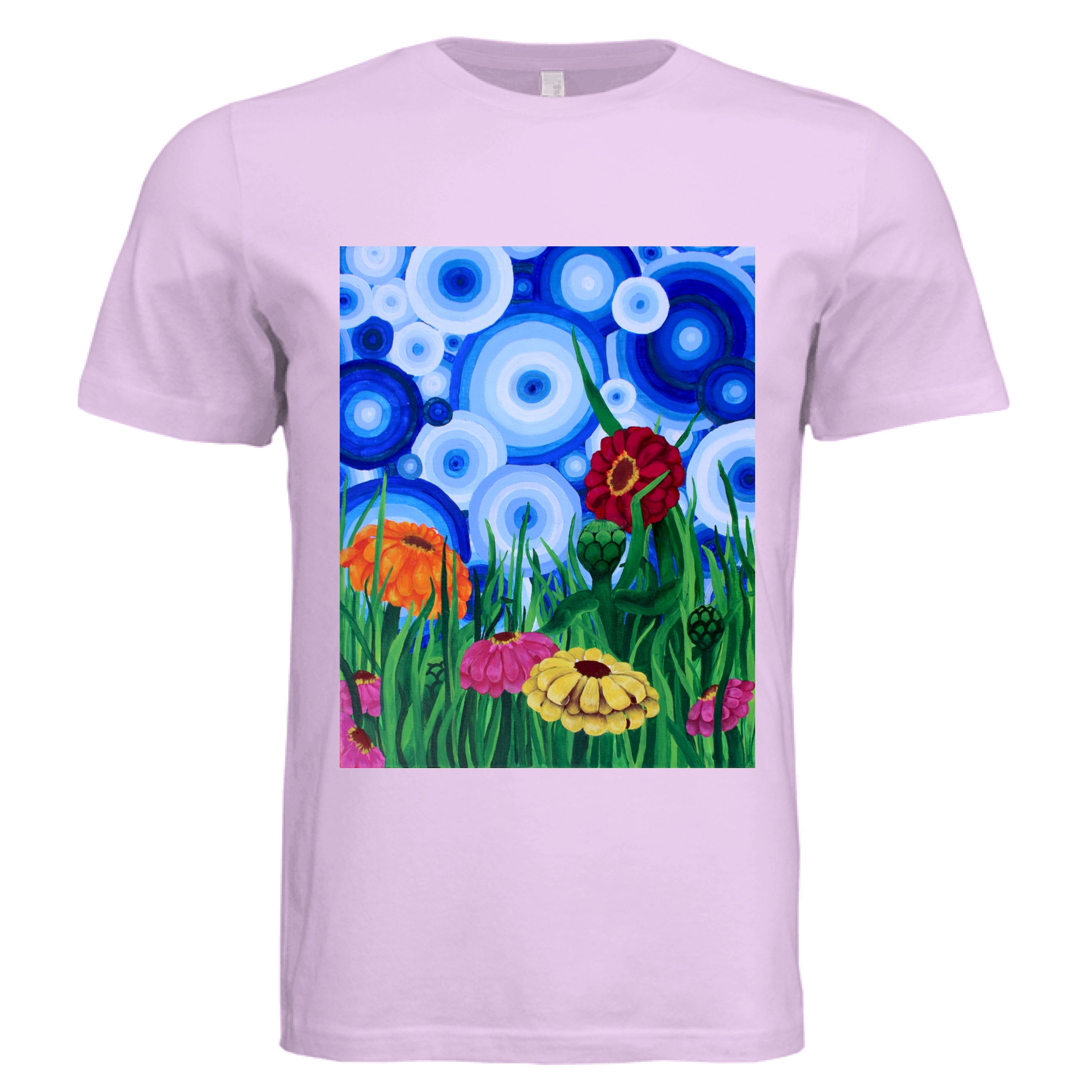 This is the Lavender Dust Zinnia 2 T-Shirt by Storm Garden Studio. This showcases the front of the shirt. The rectangular illustration are bold and color zinnias like red, yellow and orange across tall green grass. The background has many different circles in blue, dark blue and white. The shirt is against a white background.