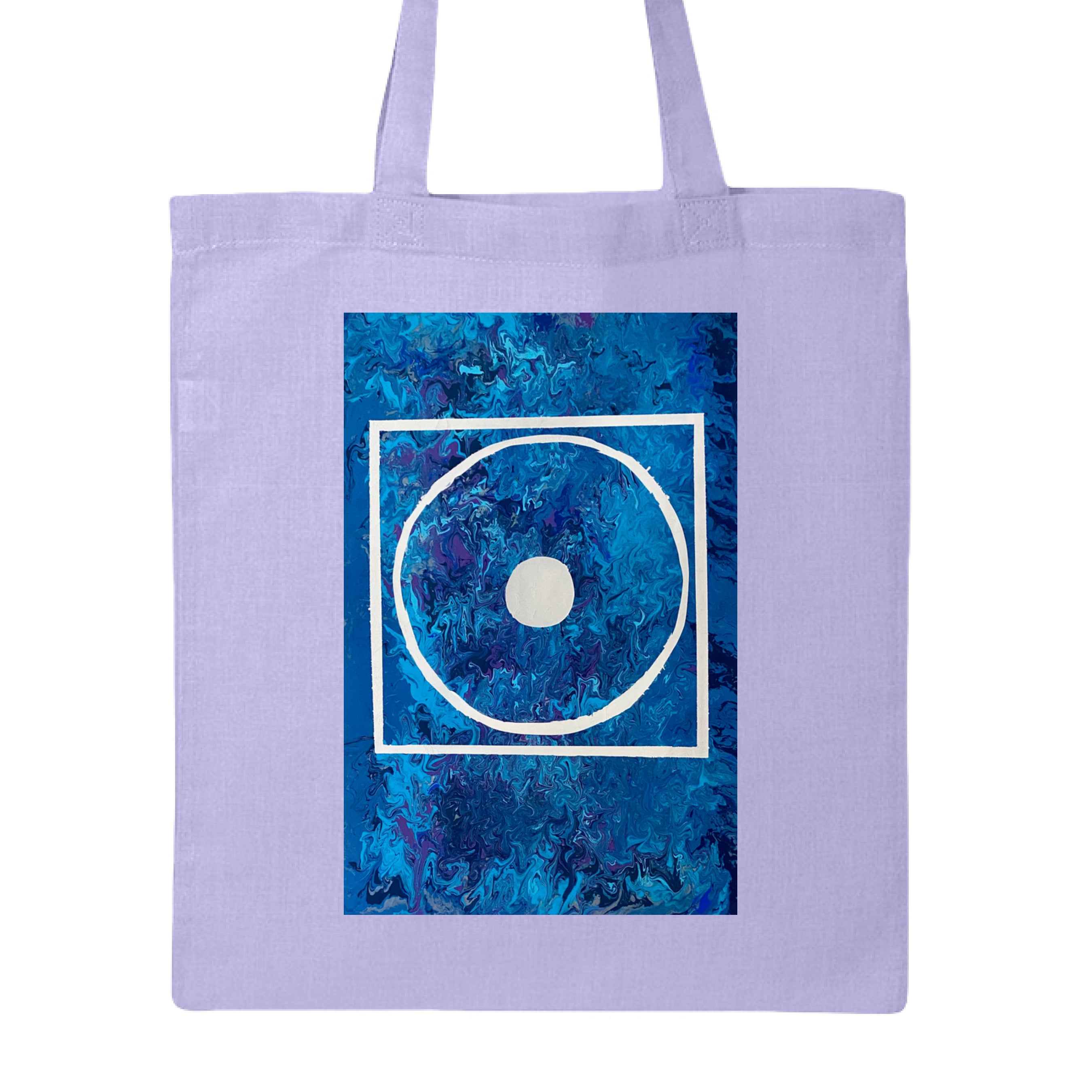 This is the Lavender Big Low Canvas Tote by Storm Garden Studio. This is showcasing the front of the tote. The illustration is rectangular and has a white filled in dot, within a outlined circle, within a outlined rectangle. The background is a mix and dip of different blues. The tote is against a white background.