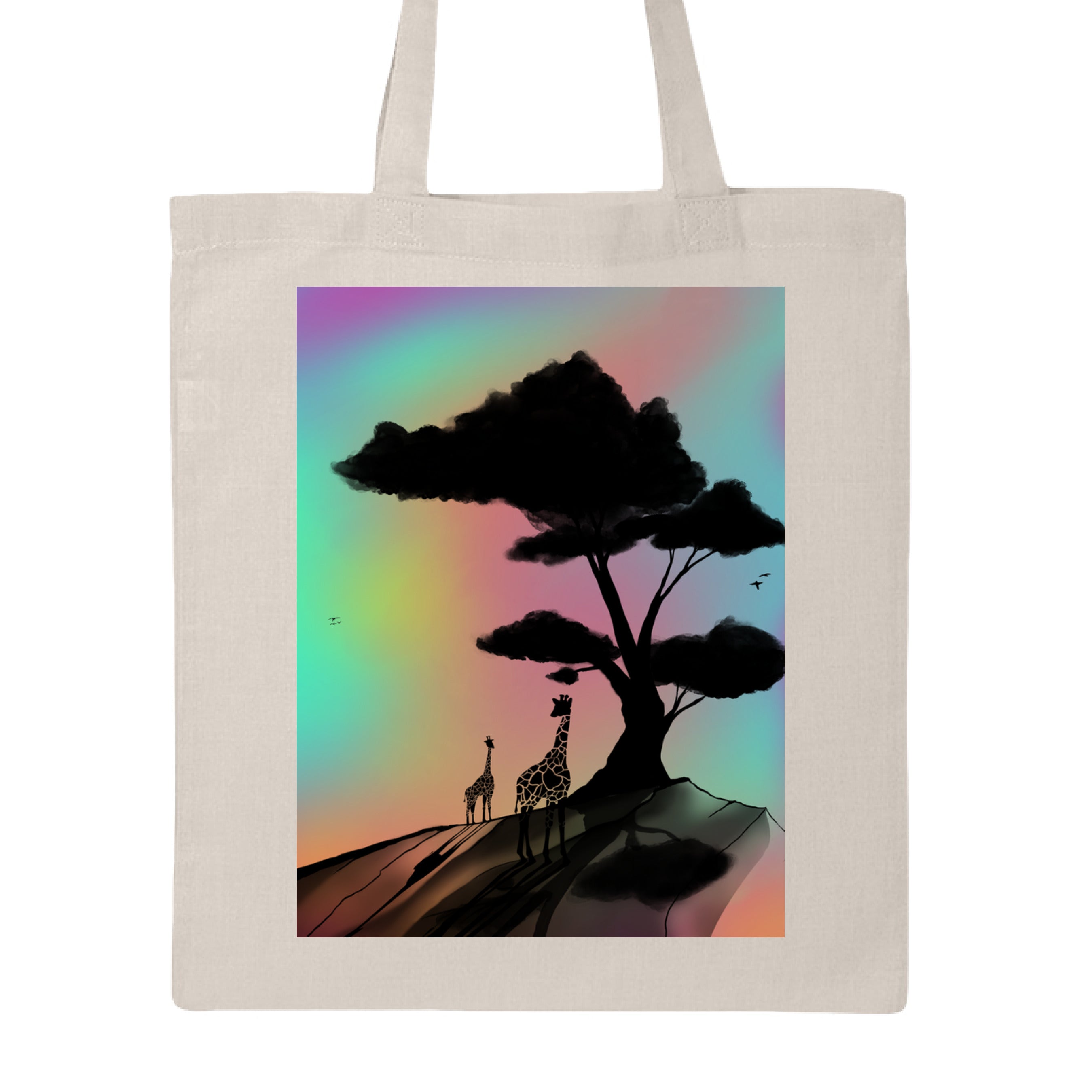 This is the Natural At a Glance Canvas Tote by Lee Hansheng Studios. This is showcasing the front of the tote. The illustration is a sillouhette of a large tree, two giraffes on a rocky hill. In the background are hues and gradients of green, yellow, purple, and red. The giraffes are looking towards to each other. It is against a white background.