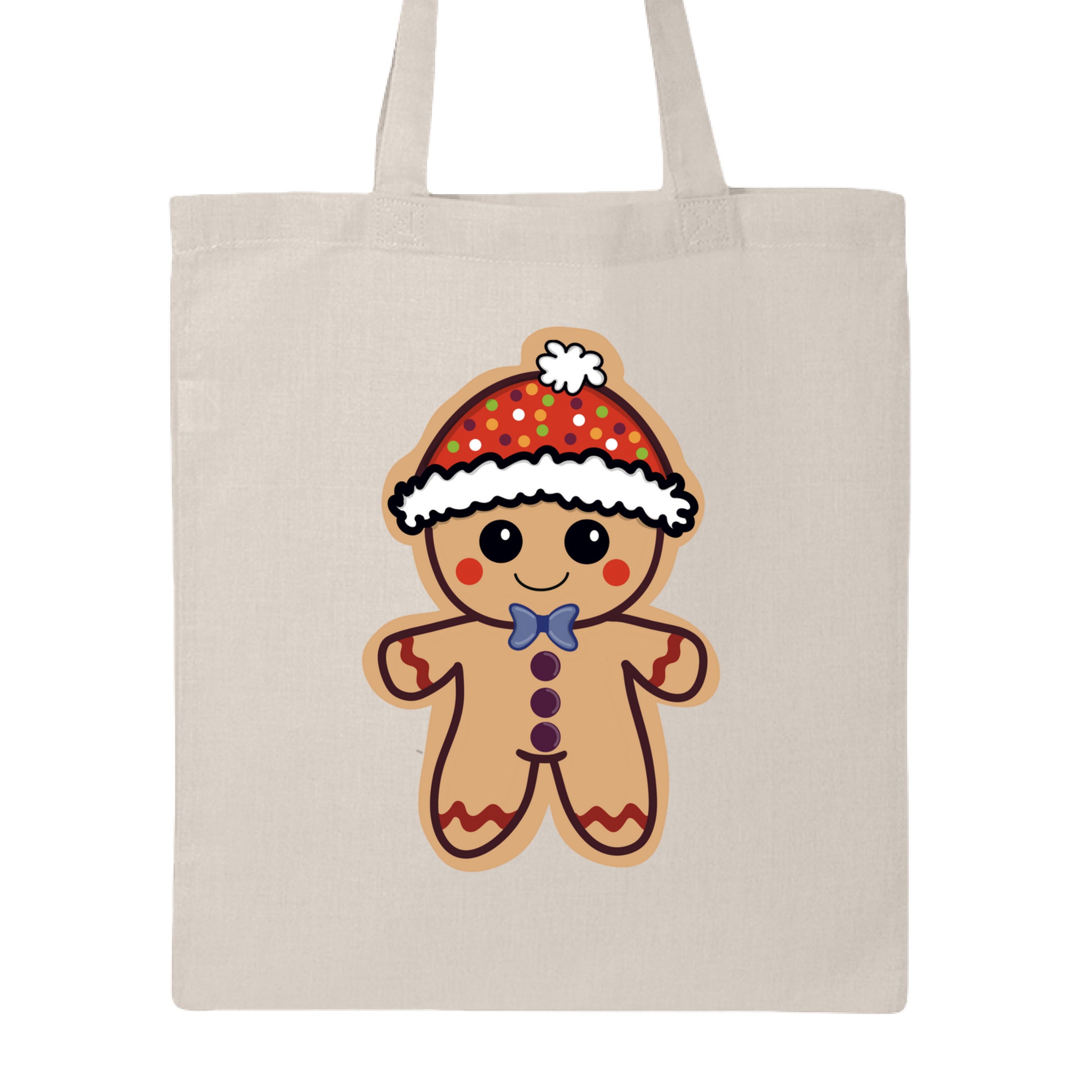 This is the Natural Ginger Bread, Ginger Dead Canvas Tote by Dazzle & Daggers Design. This is showcasing the front of the tote. The illustration is of a tan ginger bread who is smiling, red circular cheeks, red zigzags on arm and legs. The gingerbread man is wearing a polka dotted hat with a white puff and lining around the hat. The polka dots are green, blue, purple white and orange. It is against a white background.