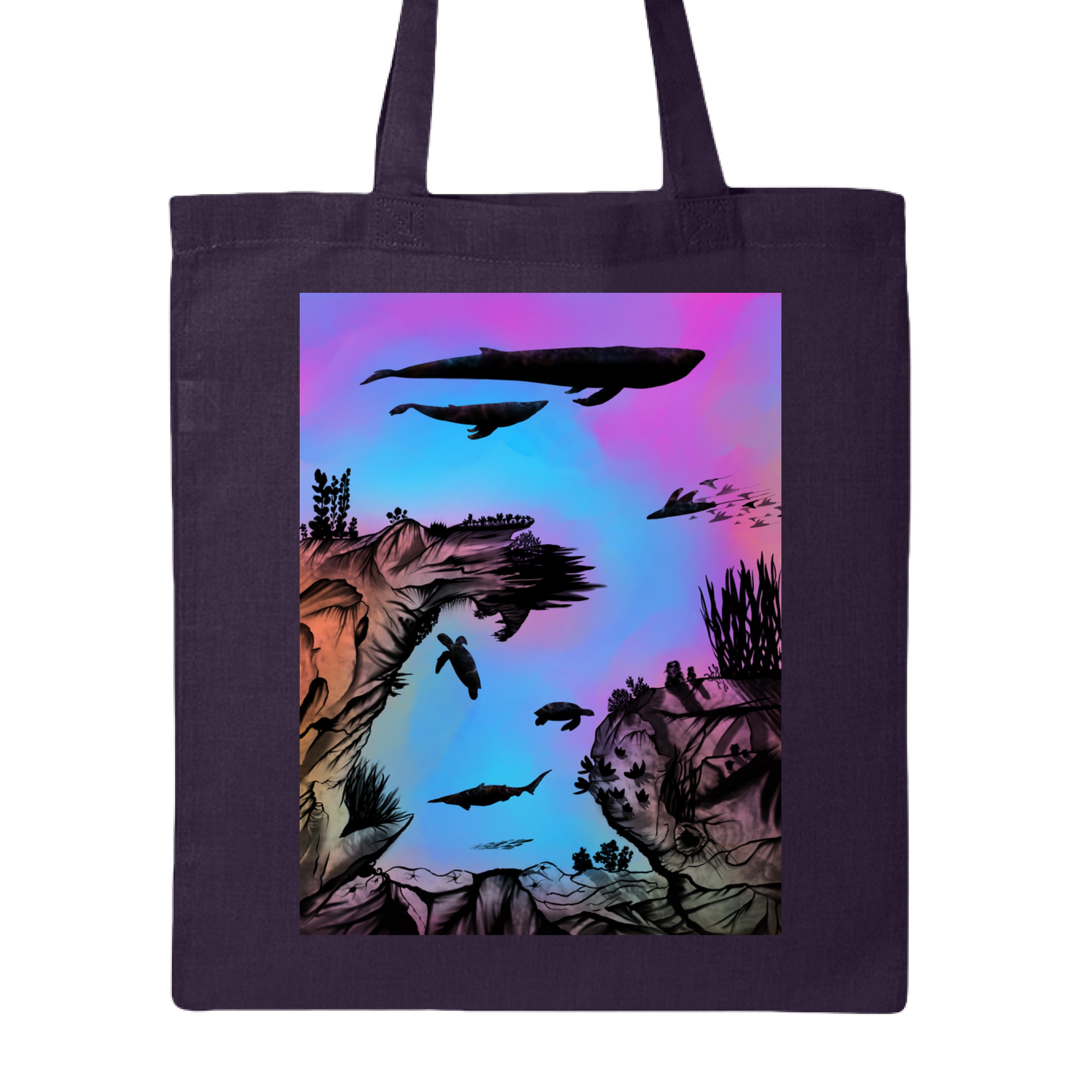 This is the Navy Into the Abyss Canvas Tote by Lee Hansheng Studios. This is showcasing the front of the tote. The illustration is of an otherworldly underwater world alive with graceful black silhouettes drifting against a luminous gradient of blues, purples, and warm tones throughout the water. To the left, right and bottom are sediment, rocks, seaweed throughout. The top has a humpback whale, another whale, below are a pool of mantis rays, two sea turtles, sea of fish. It is against a white background.