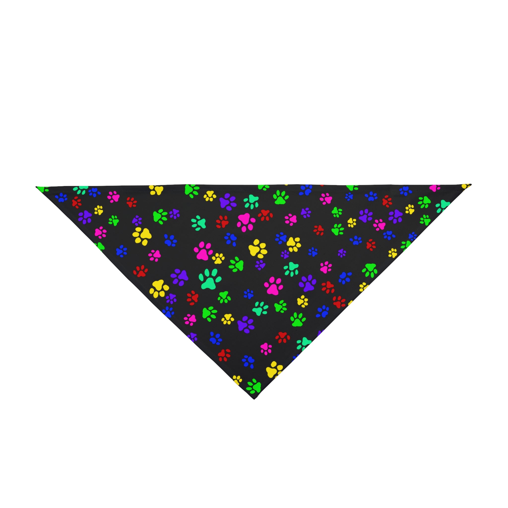This is the 27" x 13" Paws on Paws Pet Bandana. This shows bandana from the front. The design shows a triangle shape with different sized color paws on the design. The colors are yellow, green red, blue and purple on a black background. The bandana is against a white background.