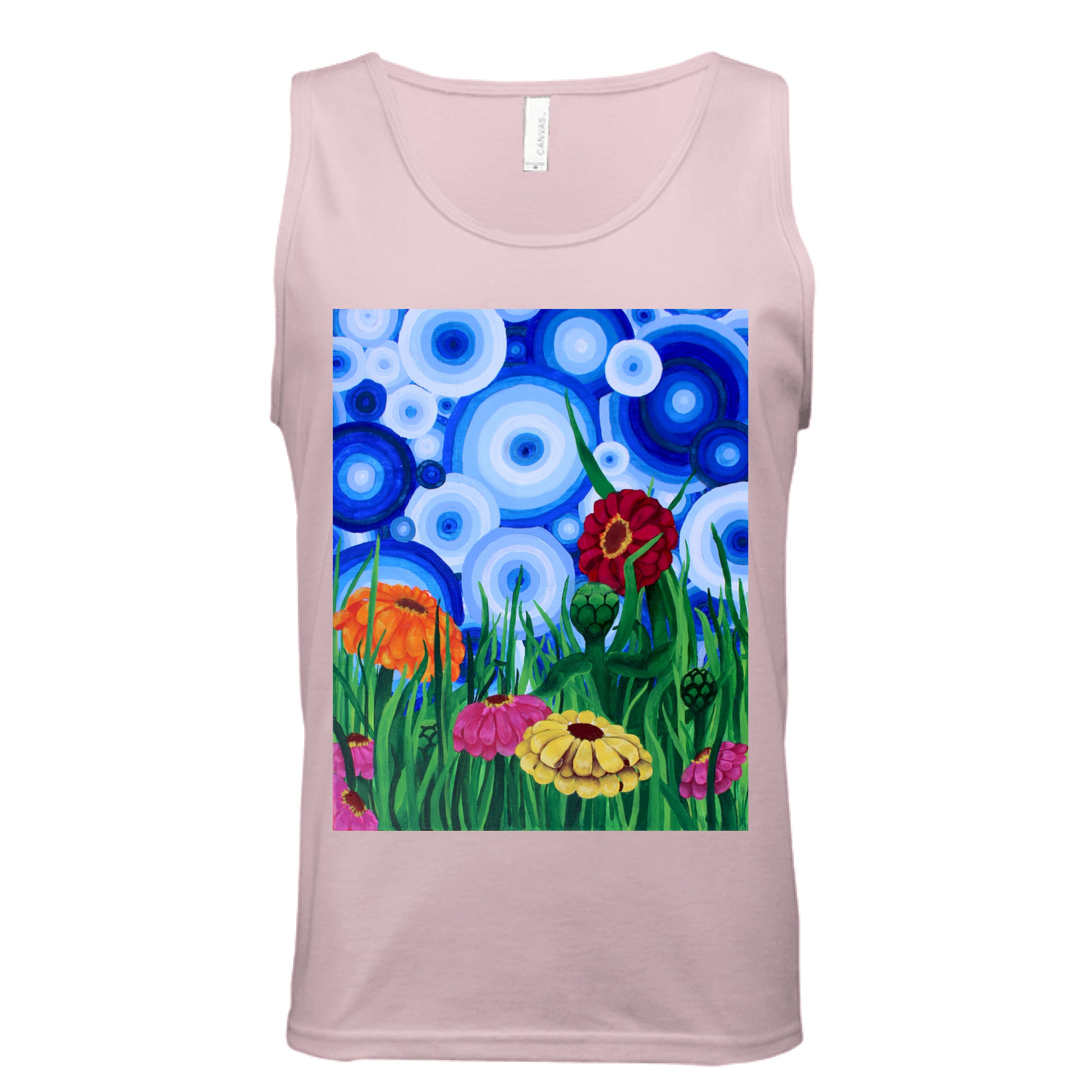 This is the Pink Zinnia 2 Tank by Storm Garden Studio. This showcases the front of the tank. The rectangular illustration are bold and color zinnias like red, yellow and orange across tall green grass. The background has many different circles in blue, dark blue and white. The tank is against a white background.