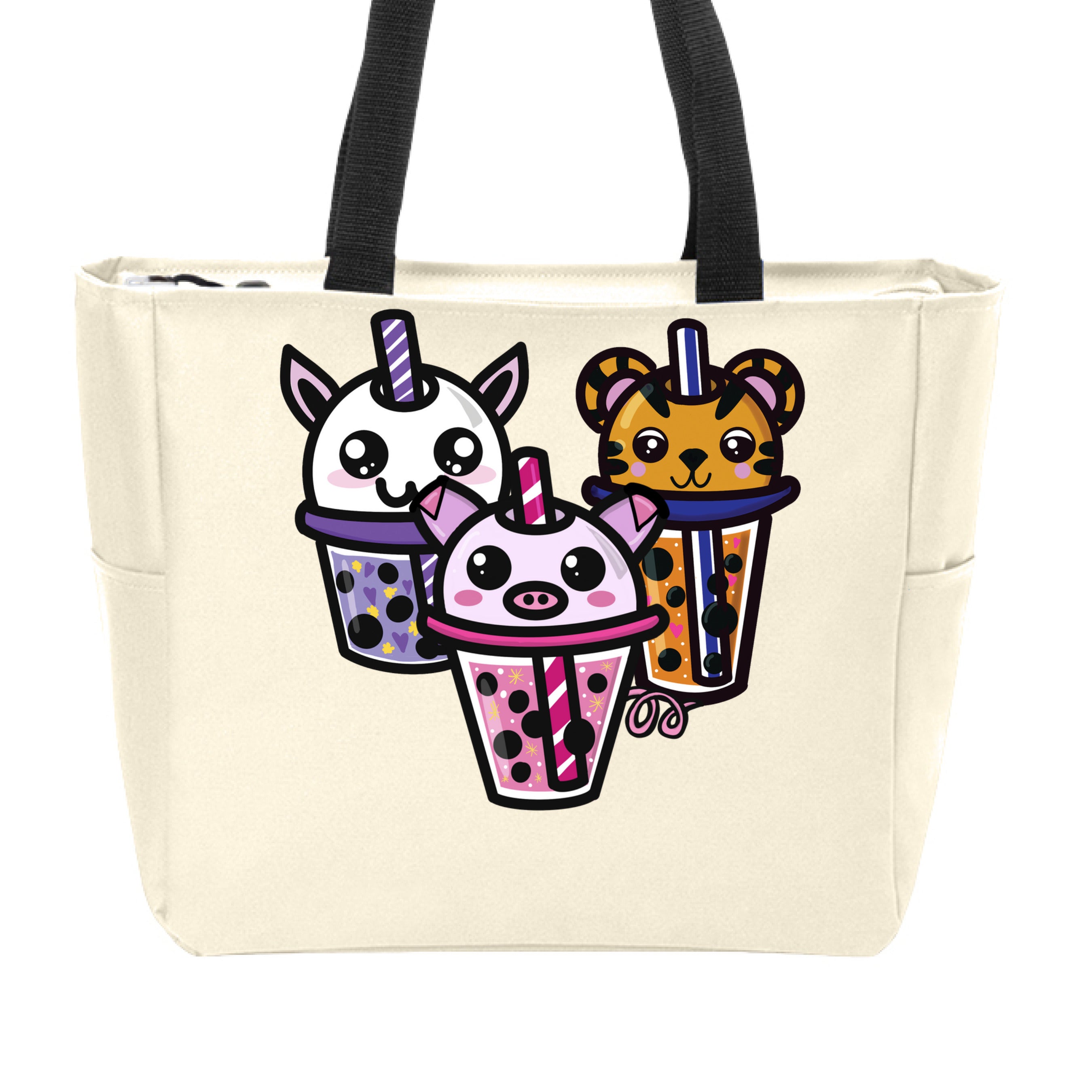 This is the Stone Boba Friends Zip Tote by Dazzle & Daggers Design. This is showcasing the front that features three kawaii designs.The Piggy Boba is pink all over and the glass has pink liquid, boba, yellow sparkles,white dots and peppermint swirl like. Thai Tea Tiger is orange, orange liquid, black boba, white dots, red hearts, blue and white striped straw. The Cryptid Boba is white, purple and white swirl straw, purple liquid, black boba, yellow stars and purple hearts. The handle is black.