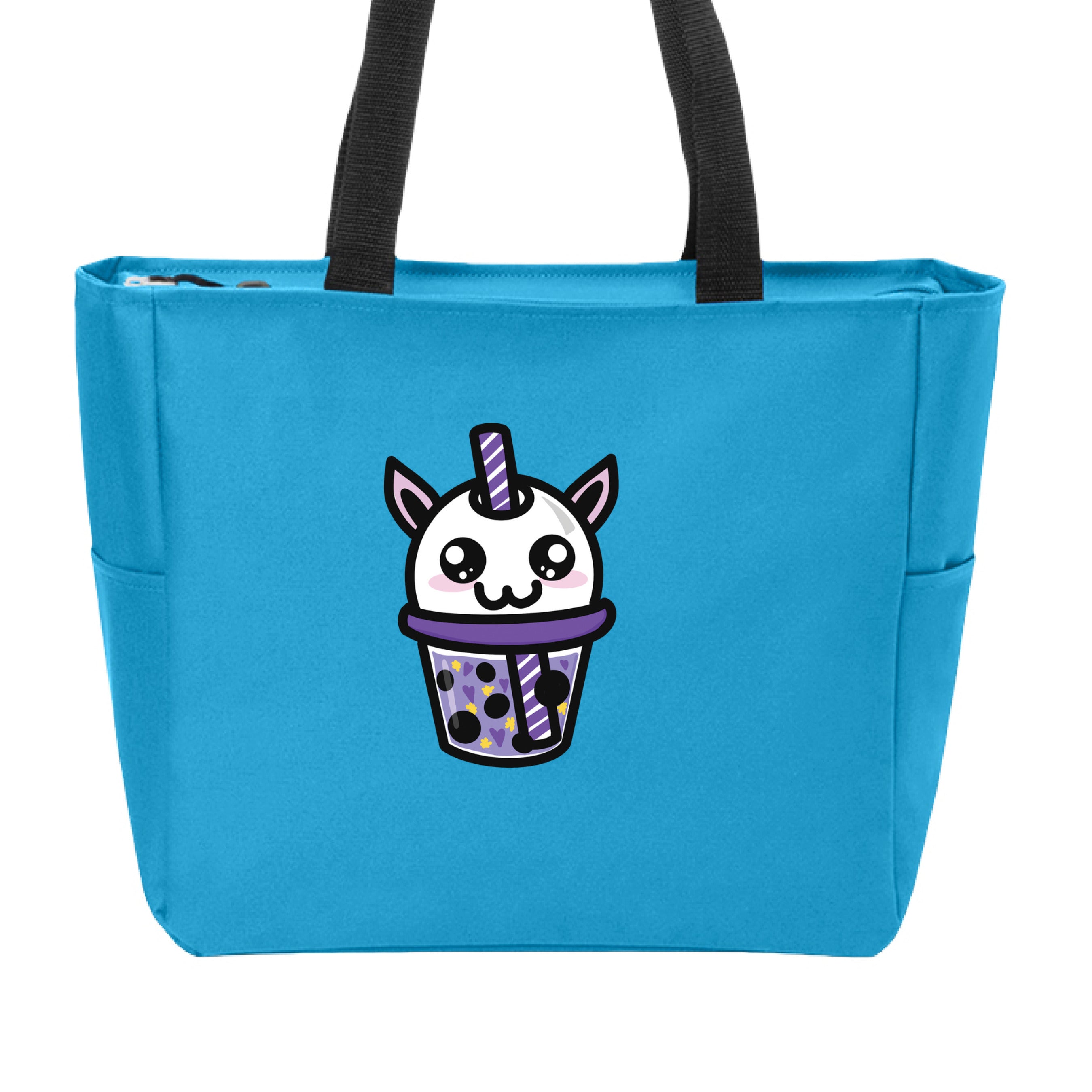 This is the Turquoise Cryptid Boba Zip Tote by Dazzle & Daggers Design. This is showcasing the front and the handles are black. The Cryptid Boba is white, has cute light pink oval cheeks under big black and white sparkly eyes. It's mouth is in the shape of the number 3, purple and white swirl straw. In the glass is purple liquid, black boba, yellow stars and purple hearts. The tote is against a white background.