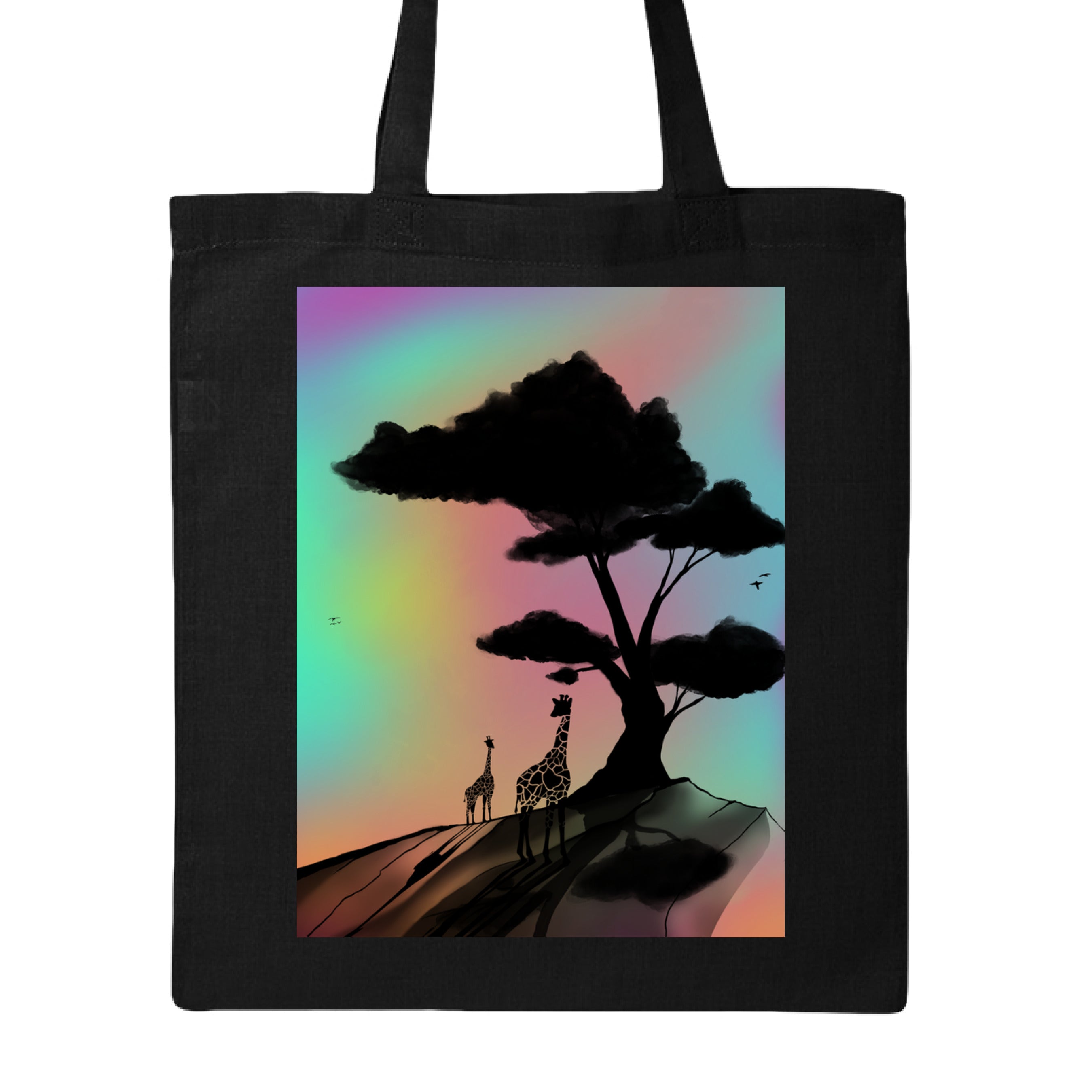 This is the Black At a Glance Canvas Tote by Lee Hansheng Studios. This is showcasing the front of the tote. The illustration is a sillouhette of a large tree, two giraffes on a rocky hill. In the background are hues and gradients of green, yellow, purple, and red. The giraffes are looking towards to each other. It is against a white background. 