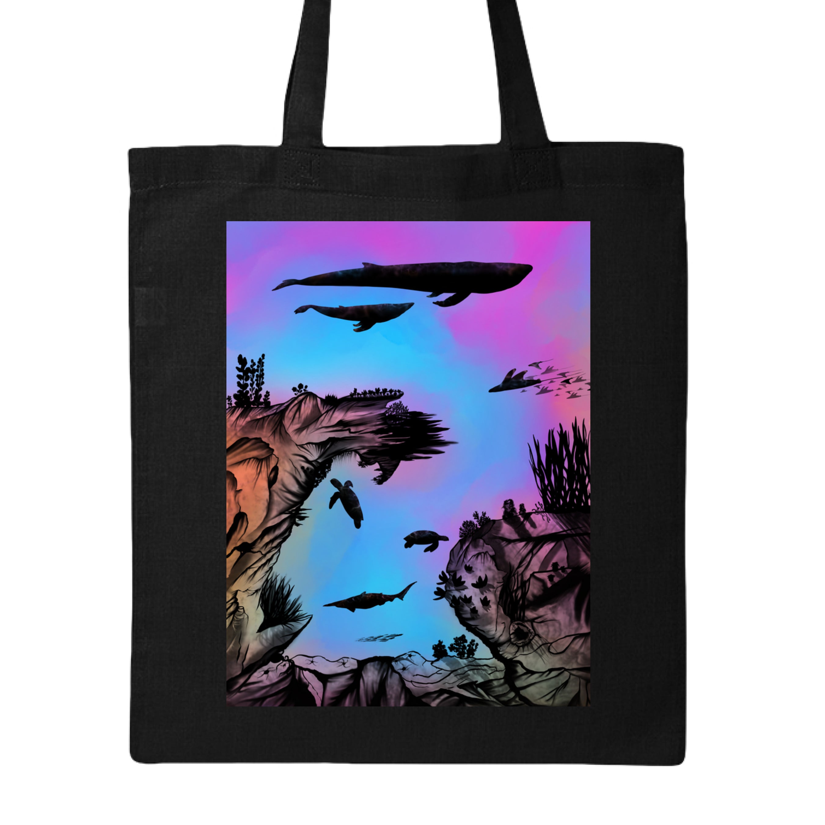 This is the Black Into the Abyss Canvas Tote by Lee Hansheng Studios. This is showcasing the front of the tote. The illustration is of an otherworldly underwater world alive with graceful black silhouettes drifting against a luminous gradient of blues, purples, and warm tones throughout the water. To the left, right and bottom are sediment, rocks, seaweed throughout. The top has a humpback whale, another whale, below are a pool of mantis rays, two sea turtles, sea of fish.It is against a white background.