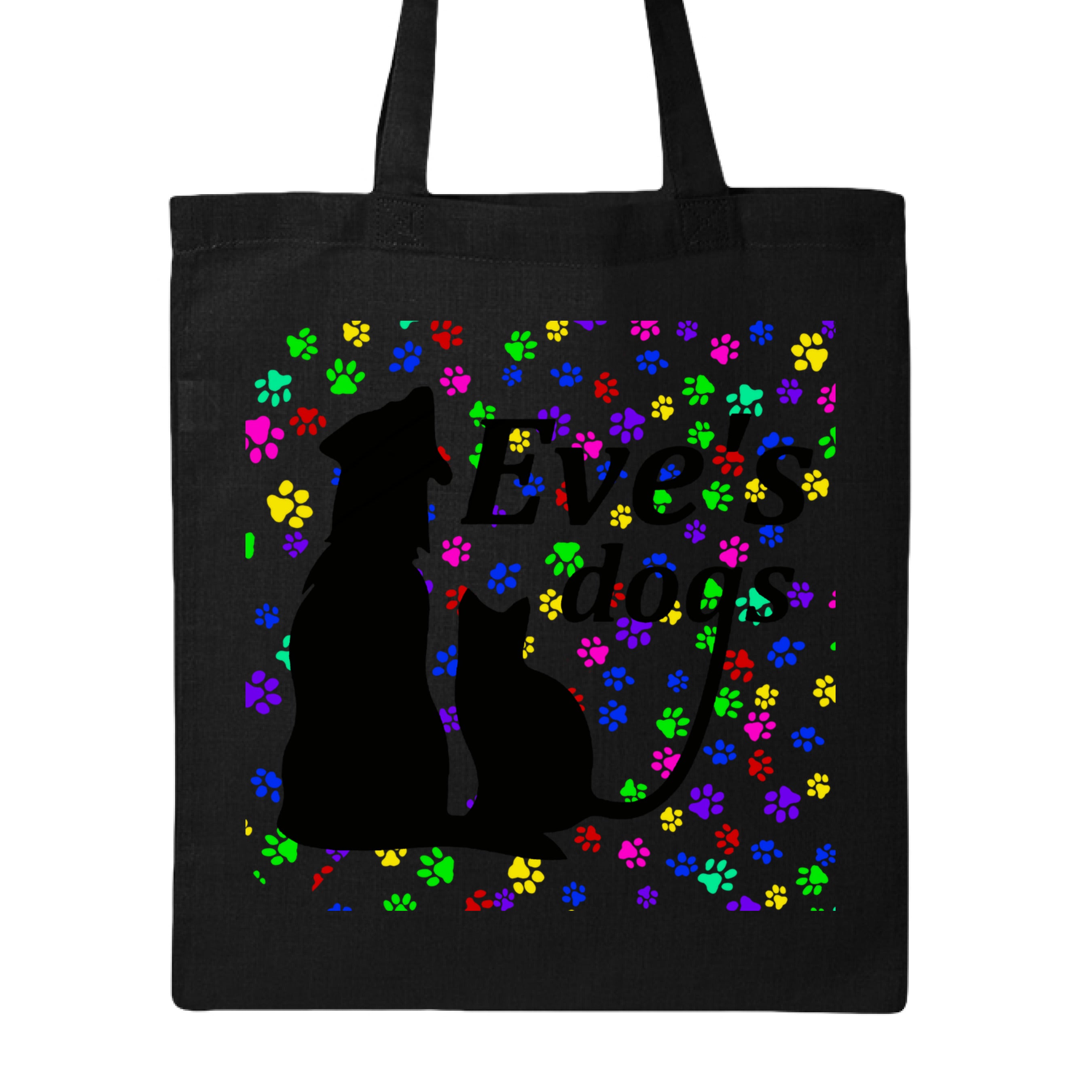 This is the Black Paws on Paws Adopt Eve's Dogs Canvas Tote to help raise awareness and adopt. This is showcasing the front of the tote. There is an image of their logo which is in black writing of "Eve's Dogs". The "g" connects to the tail of the cat who is sitting next to the dog. Both are black shadows. The background is colorful paw prints which is bright green, blue pink, yellow and red. It is against a white background.