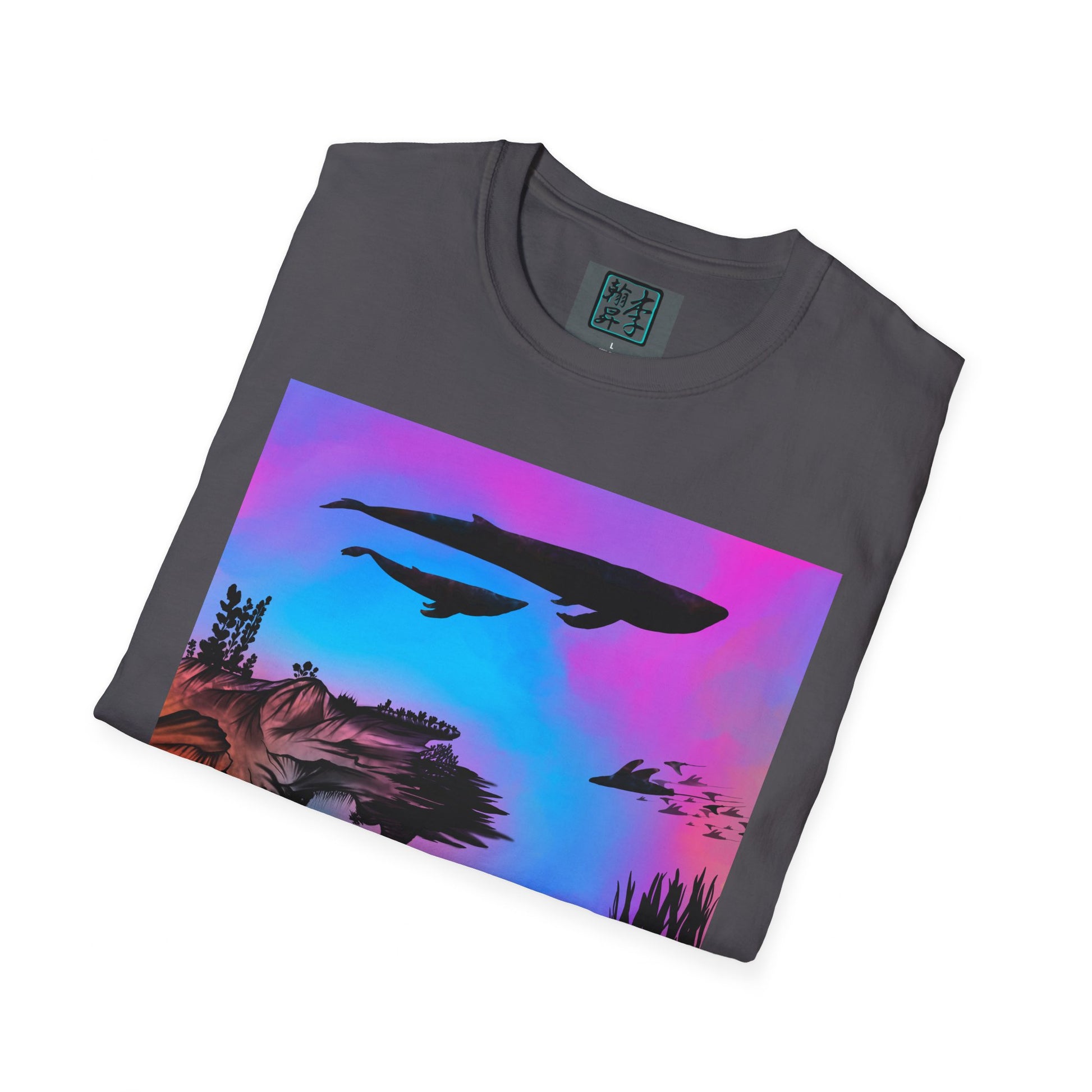 This is the Charcoal Into the Abyss Softstyle T-Shirt by Lee Hansheng Studios. This shows the front of the shirt folded. The illustration is underwater seascape with aquatic plants on a marbled background. What can be seen is the two blue whales and a school of fish. The inside of the shirt has a gray label with the studio logo and the size label underneath printed in white. The shirt is against a white background.