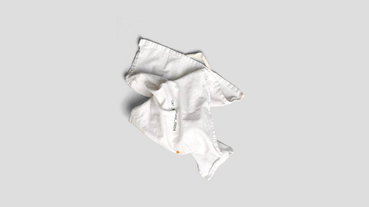 This is the clean rag shown on a gray background. The rag is disheveled and as numbers or letterings on it. 