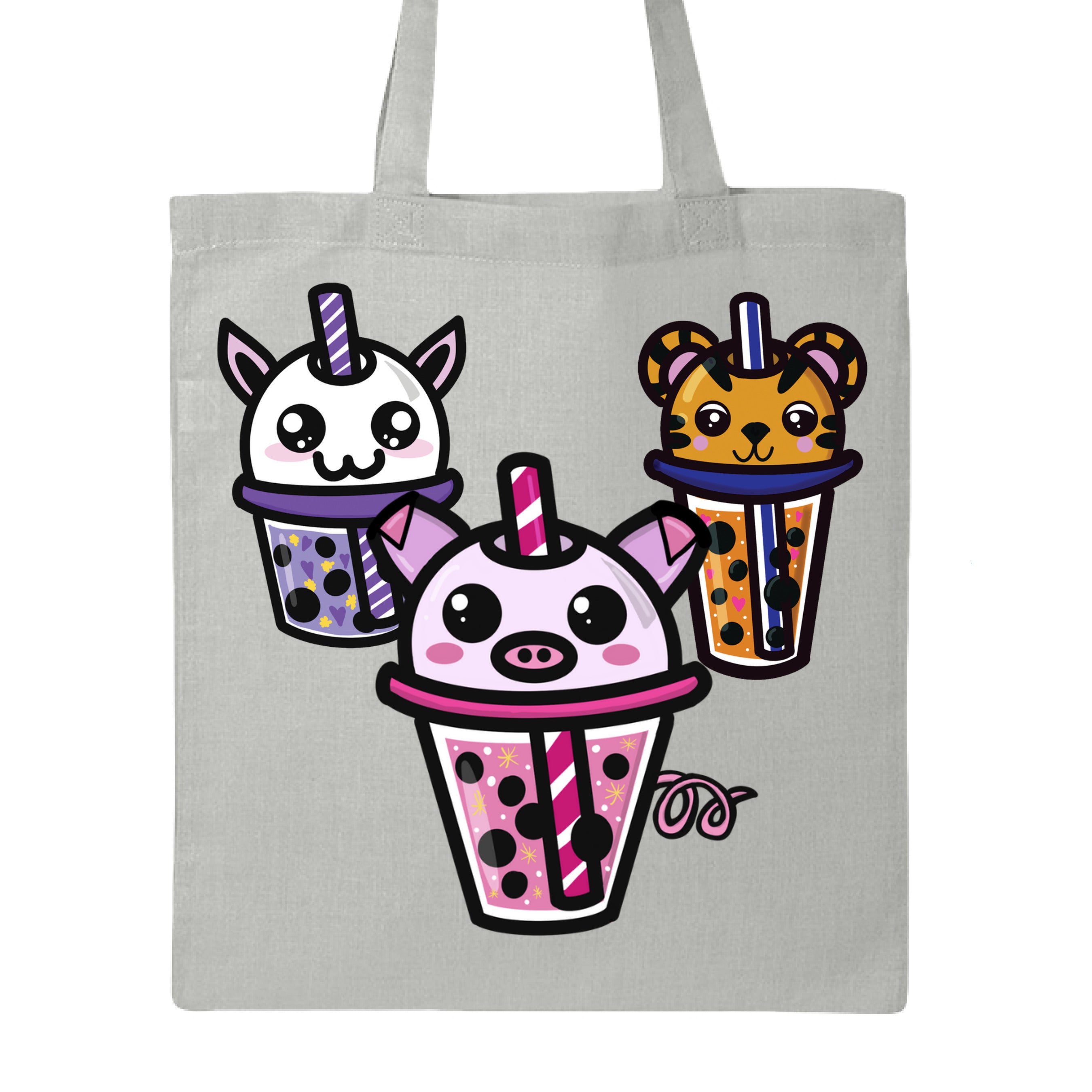 This is the Grey Boba Friends Canvas Tote by Dazzle & Daggers Design. This is showcasing the front that features three kawaii designs.The Piggy Boba is pink all over and the glass has pink liquid, boba, yellow sparkles,white dots and peppermint swirl like. Thai Tea Tiger is orange, orange liquid, black boba, white dots, red hearts, blue and white striped straw. The Cryptid Boba is white, purple and white swirl straw, purple liquid, black boba, yellow stars and purple hearts.