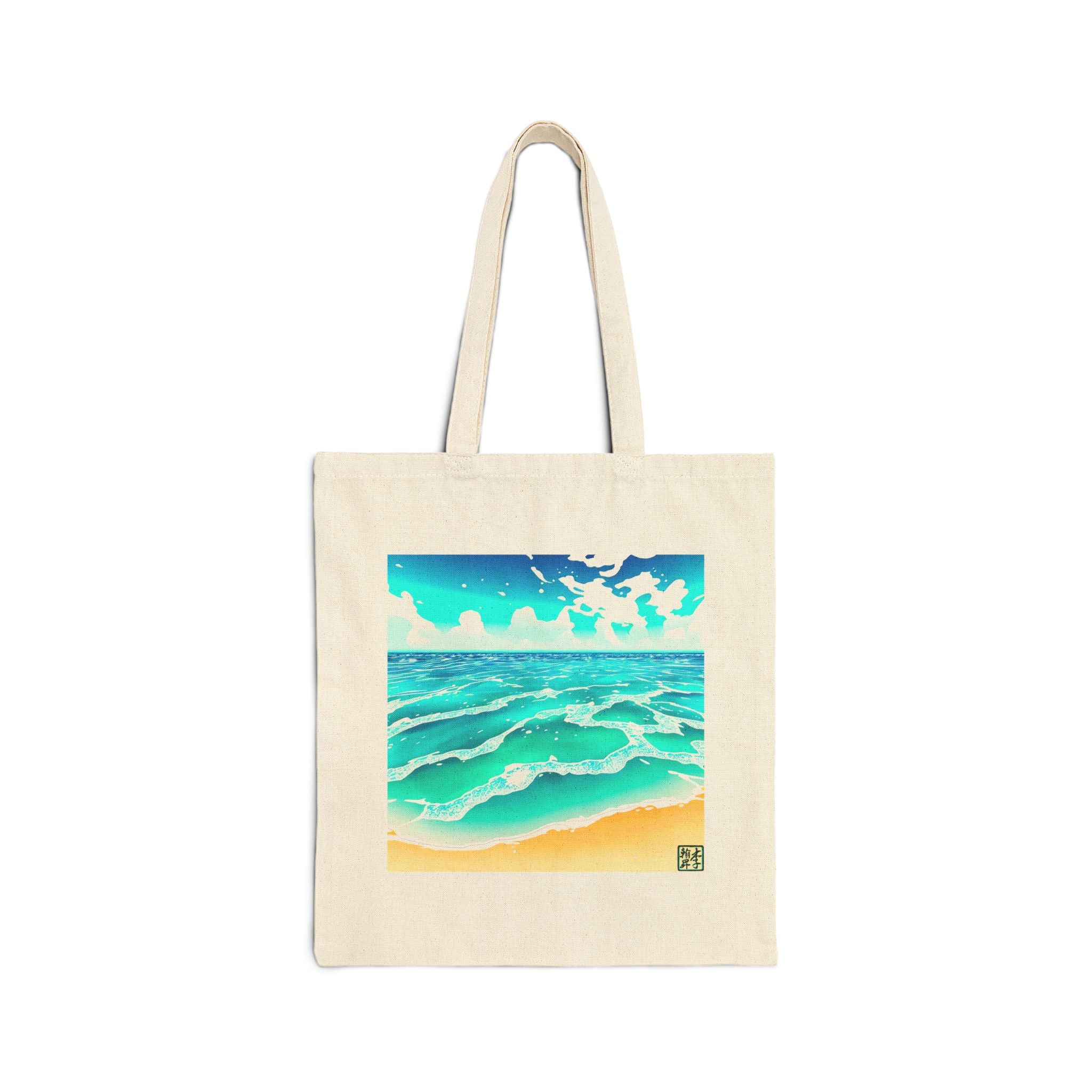 This is the Natural Beach Life Canvas Tote by Lee Hansheng Studios. The illustration is squared. The foreground has sand and the studio logo on the right corner outlined in blue. The waves are crashing into the sand with fluffly clouds in the back. There are mixes of blue, light blue, white, orange and tan colors.
