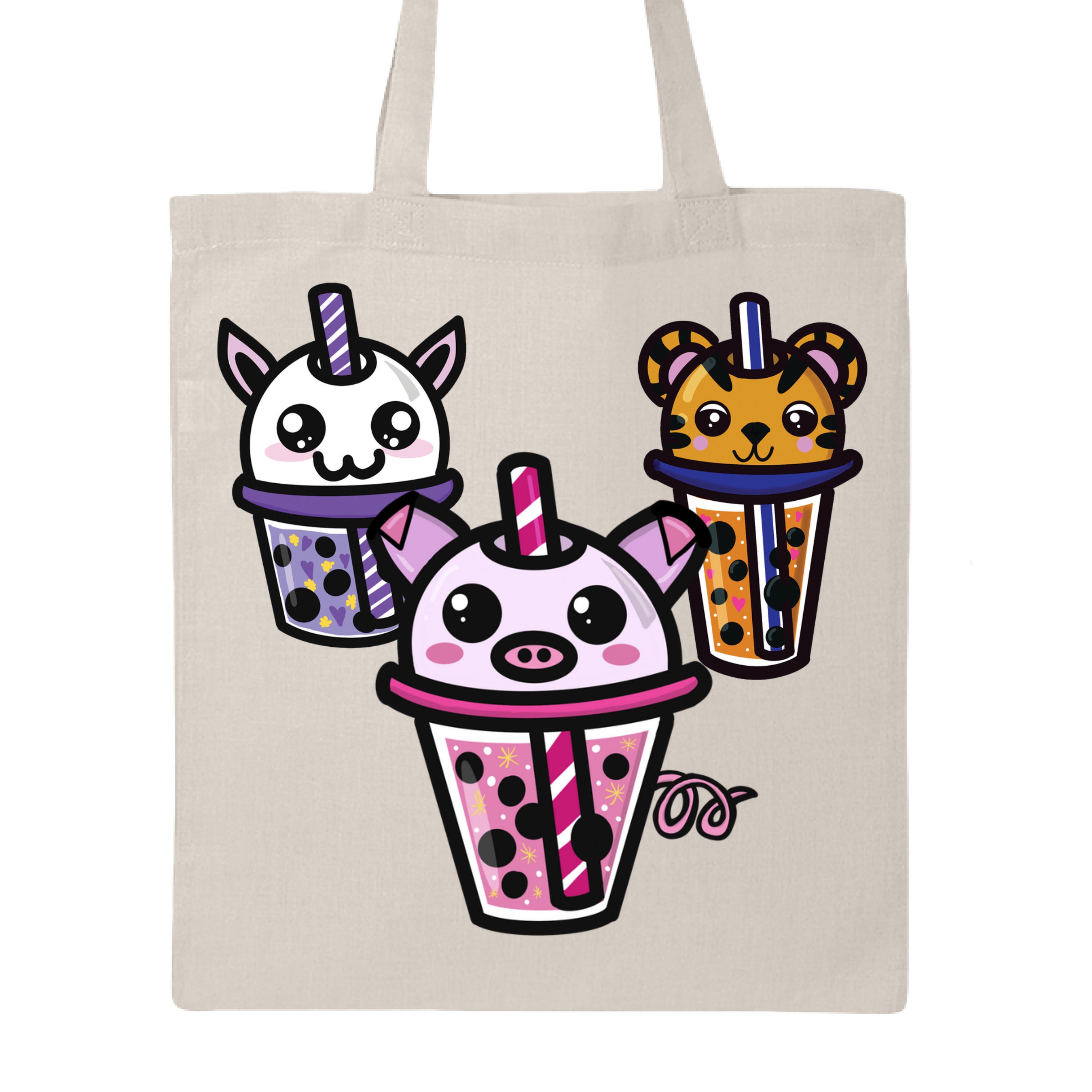 This is the Natural Boba Friends Canvas Tote by Dazzle & Daggers Design. This is showcasing the front that features three kawaii designs.The Piggy Boba is pink all over and the glass has pink liquid, boba, yellow sparkles,white dots and peppermint swirl like. Thai Tea Tiger is orange, orange liquid, black boba, white dots, red hearts, blue and white striped straw. The Cryptid Boba is white, purple and white swirl straw, purple liquid, black boba, yellow stars and purple hearts.