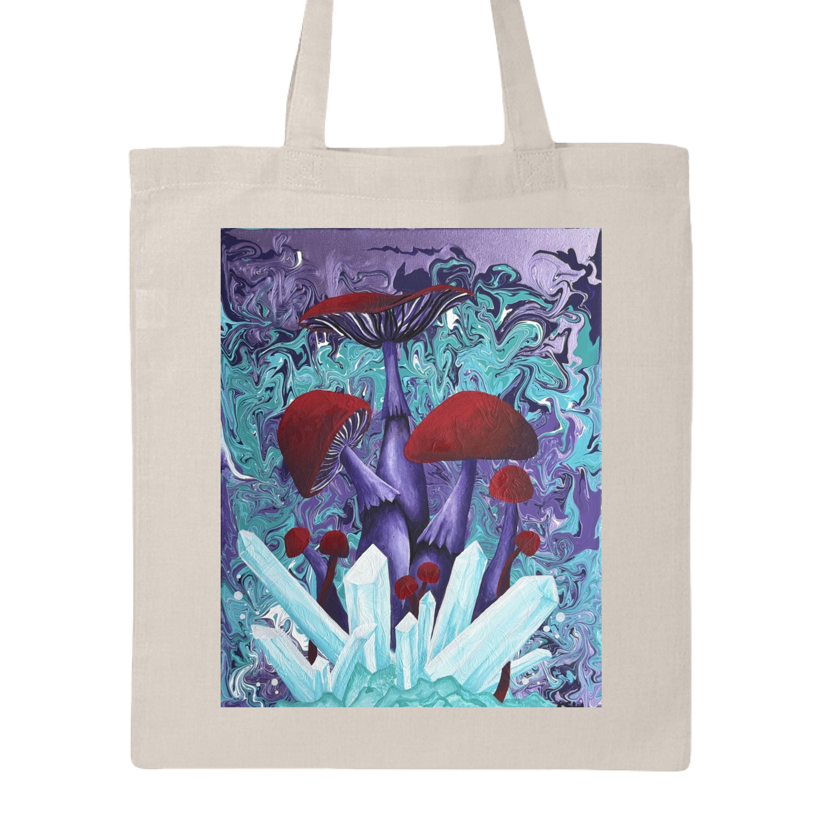 This is the Natural Crystal Mushrooms Canvas Tote by Storm Garden Studio. This is showcasing the front of the tote. The illustration is rectangular and has a blue, purple, dark purple and white pouring or mixing in the background. In the forefront are blue and white crystals coming up from the ground. Behind that are different sizes of mushrooms, circular, rounded tops and flared with shades of red. The stems of the mushroom are dark purple. The tote is against a white background.