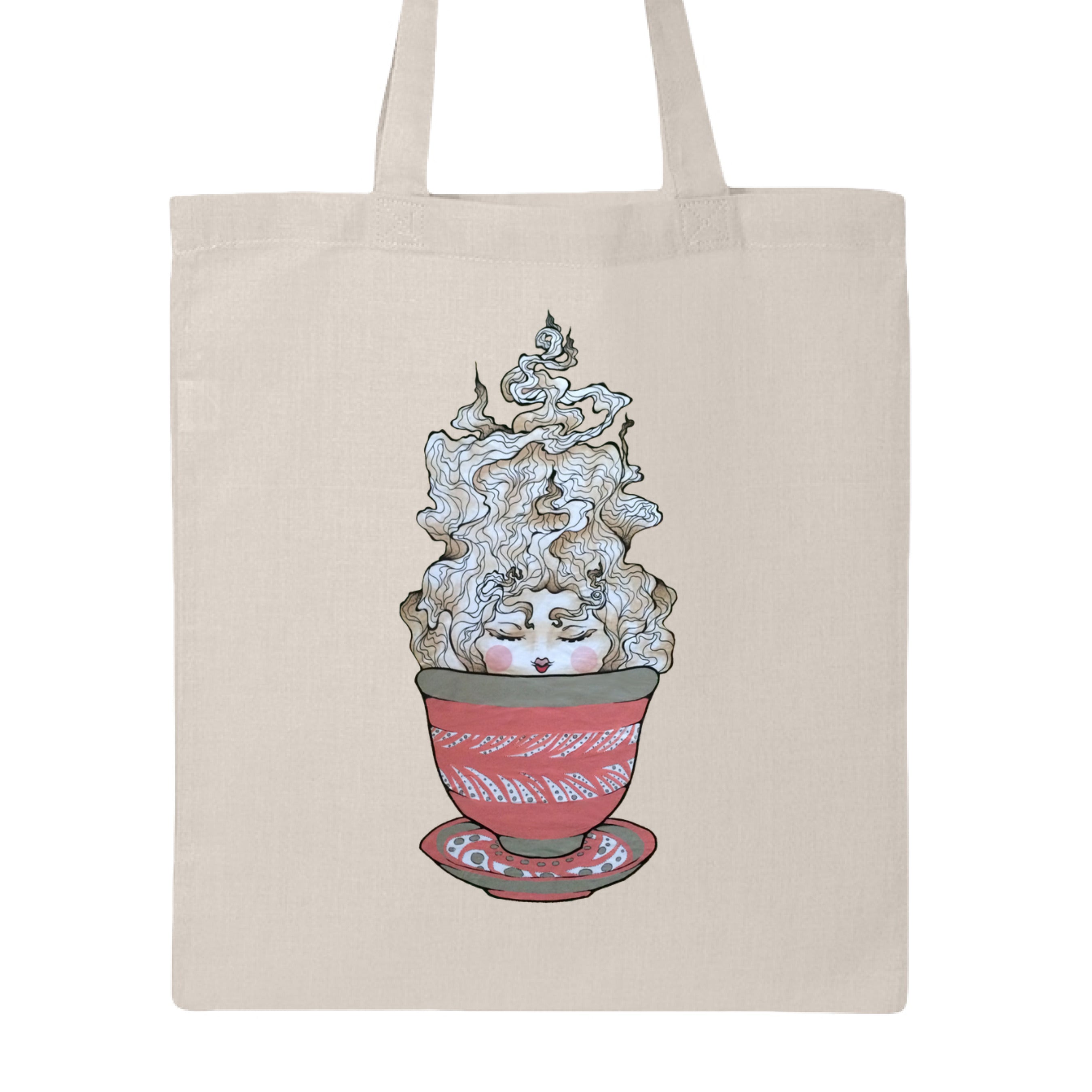 This is the Natural Green Tea Canvas Tote by Chris Foster Design. This is showcasing the front of the tote. The illustration is a tea sprite. There's a woman's face with curly hair/steam that is white and tan/beige inside an intricately designed pink/red teacup with a saucer that has white and black dashes or swirl patterns. The tote is against a white background. 