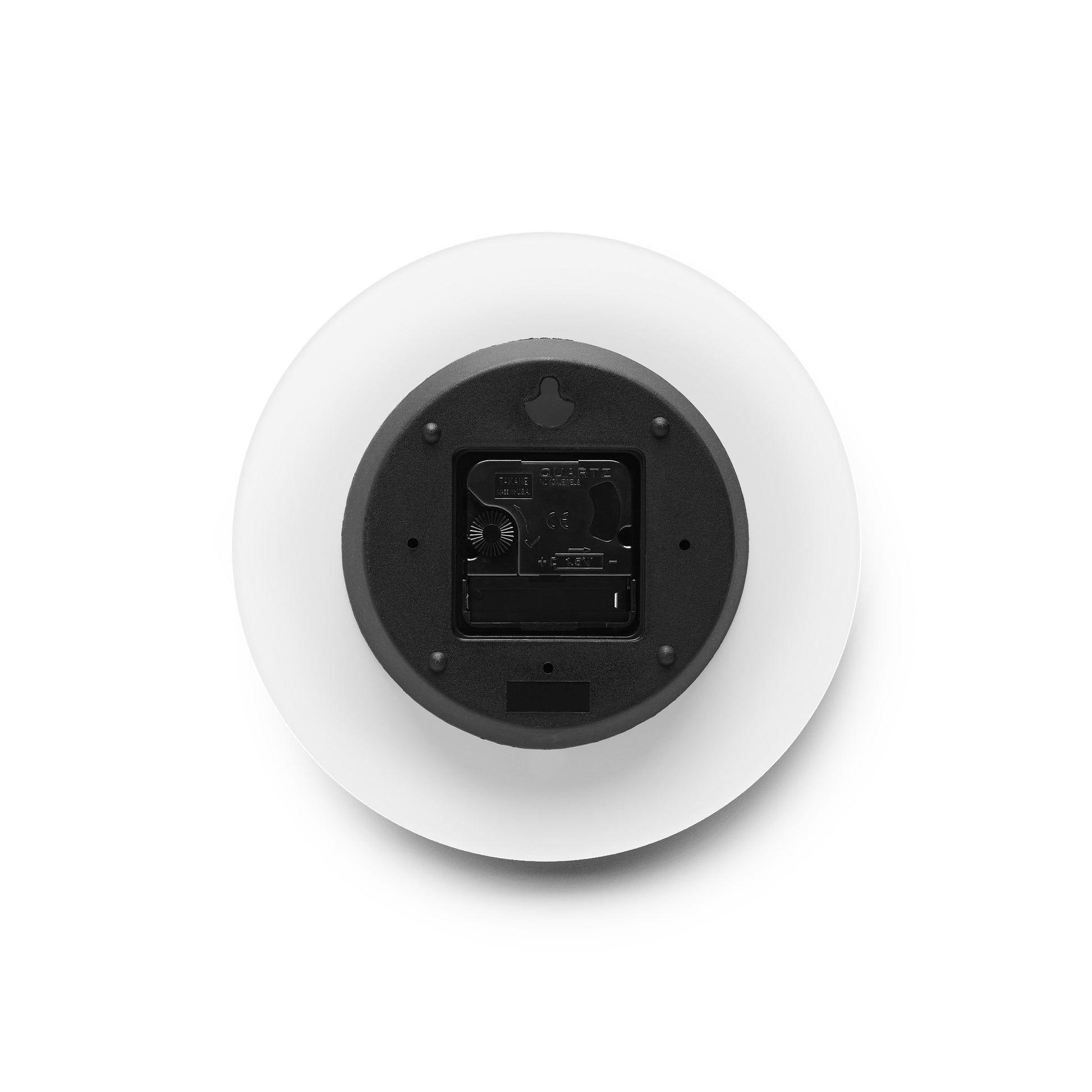 This is the 8" x 8" Pink Dreamscape Acrylic Round Wall Clock. The image showcases the back of the clock where the batteries would go. It has a black battery block and around it is white for the suface of the clock. It is against a white background.