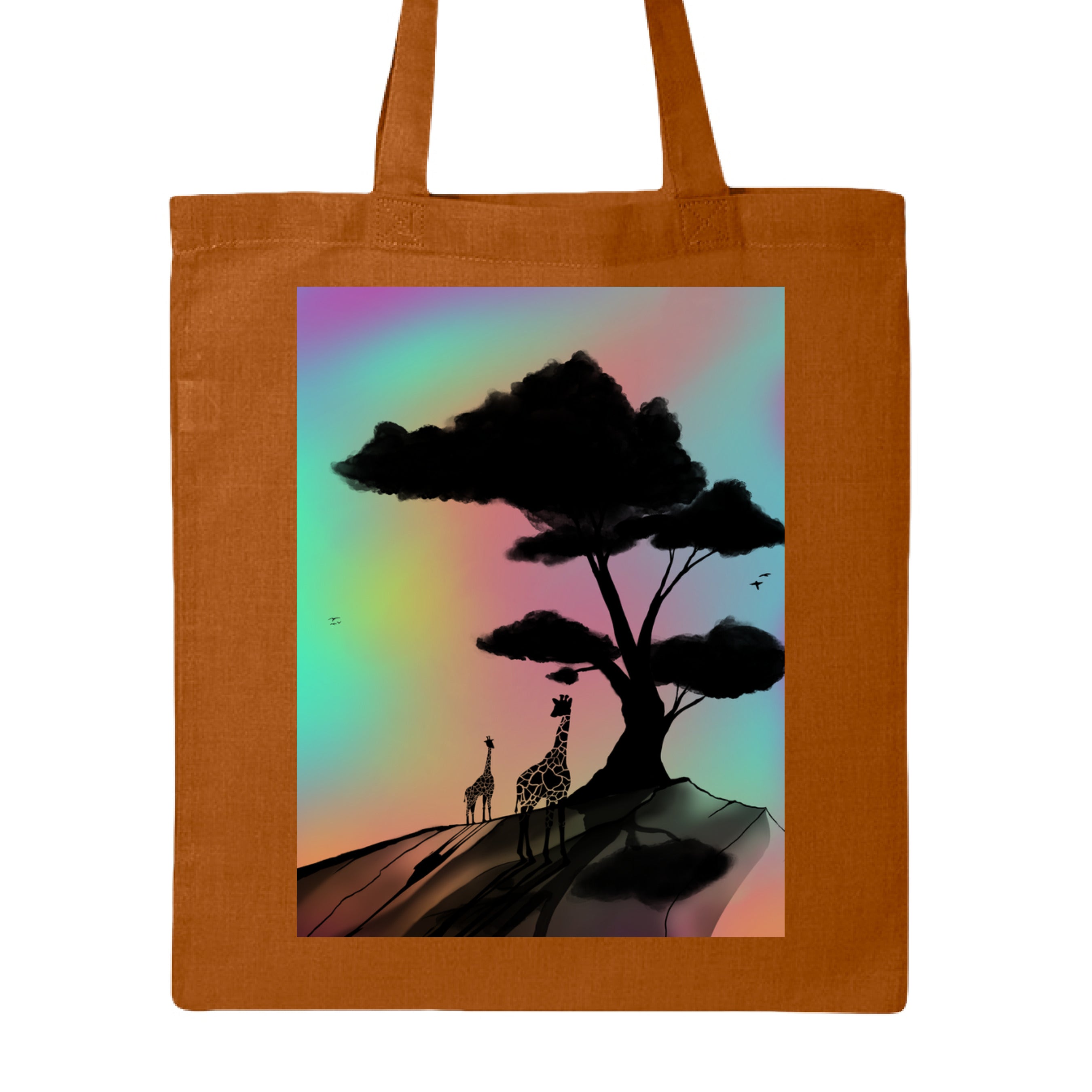 This is the Texas Orange At A Glance Canvas Tote by Lee Hansheng Studios. This is showcasing the front of the tote. The illustration is a sillouhette of a large tree, two giraffes on a rocky hill. In the background are hues and gradients of green, yellow, purple, and red. The giraffes are looking towards to each other. It is against a white background. 