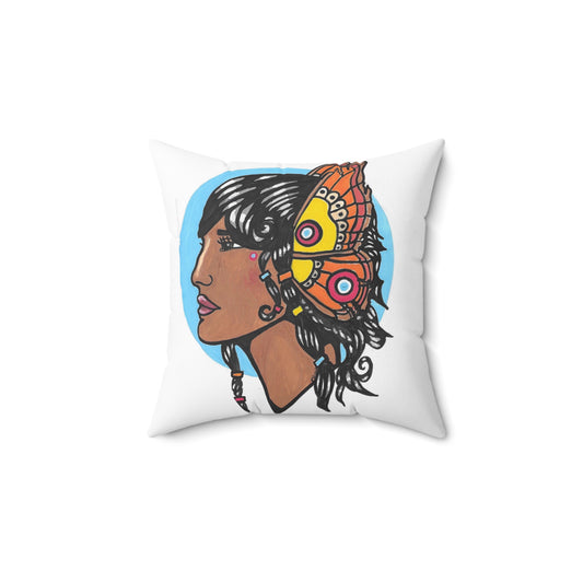 This is a 14" x 14" Warrior Spun Polyester Square Pillow by Storm Garden Studio. This showcases the back of the pillow with a light blue circular background and a darker-skinned woman facing the left. She has light pink lips, high bridged nose and is has a delicare butterfly headpeice that is yellow, red, blue, coloration with black and white intricate lining. Her hair is shiny black with various colors of hair bands throughout her hair.