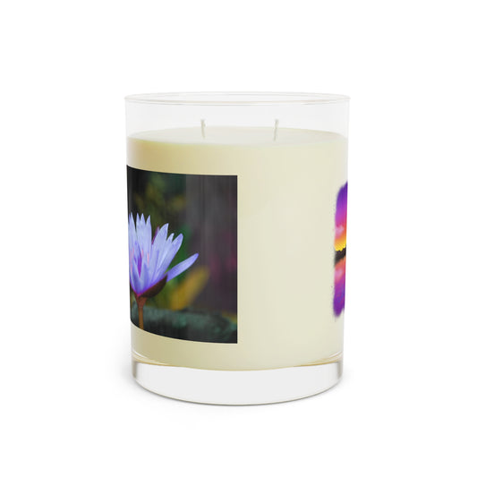 This is the Soothe Your Soul and Choose Zen by Lee Hansheng Studios. This is the left side of the glass candle which is white tea and fig scented. There is a wrap-around print on the candle which showcases a photographic print of a mini flower lilly. The lilly is slightly blooming and a light blue/purple color. The image has a dark green/green forest background. The candle is against a white background. 